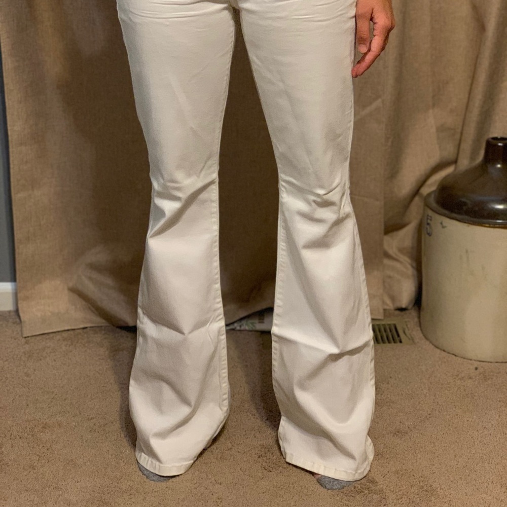 White flare pants